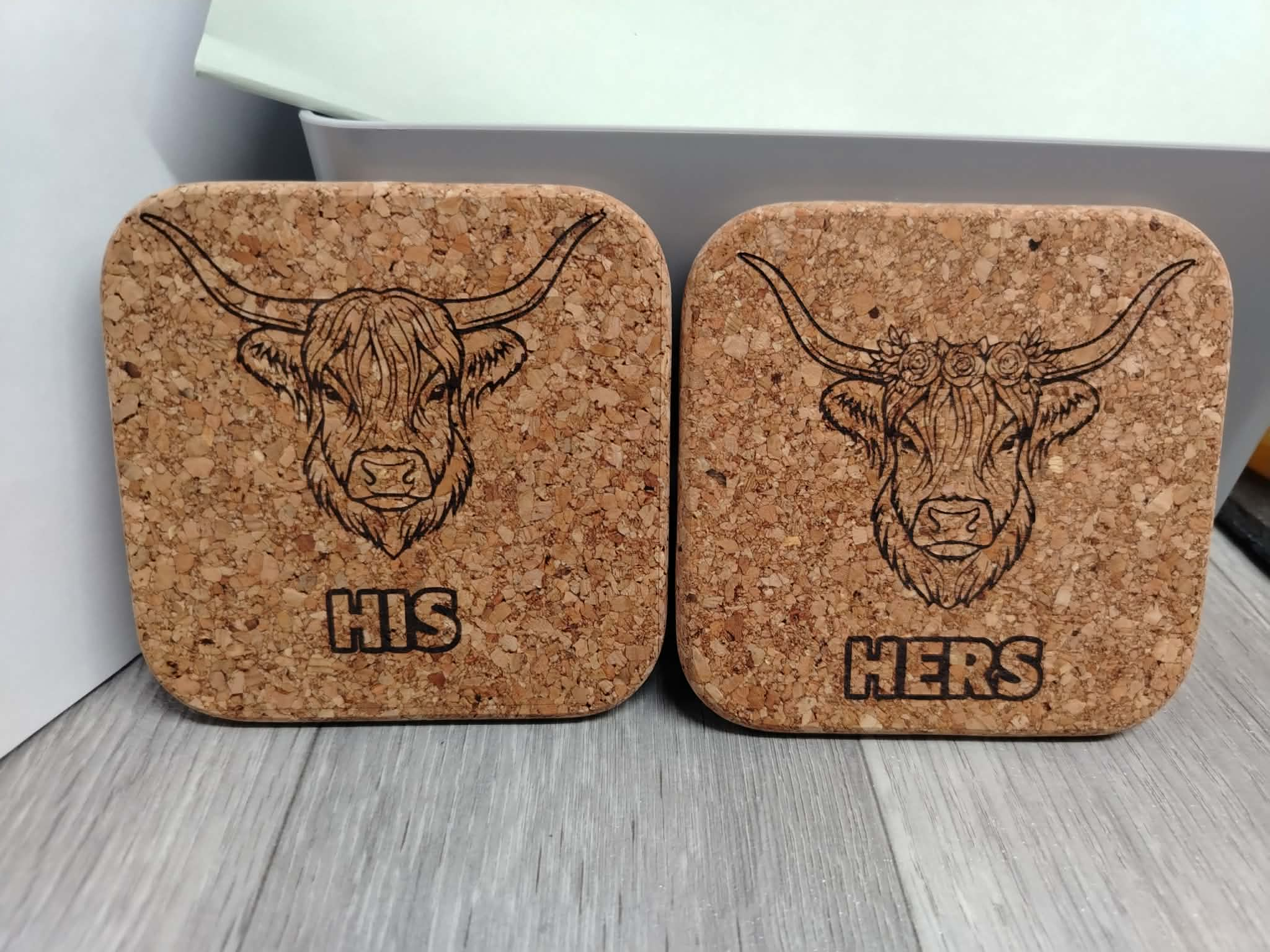 His and Hers highland cow coaster