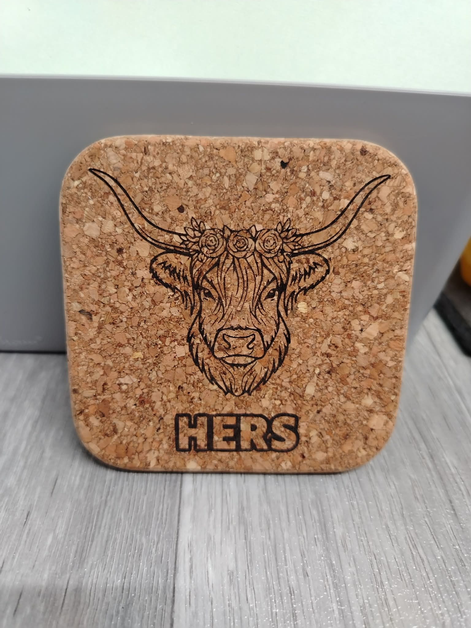 His and Hers highland cow coaster