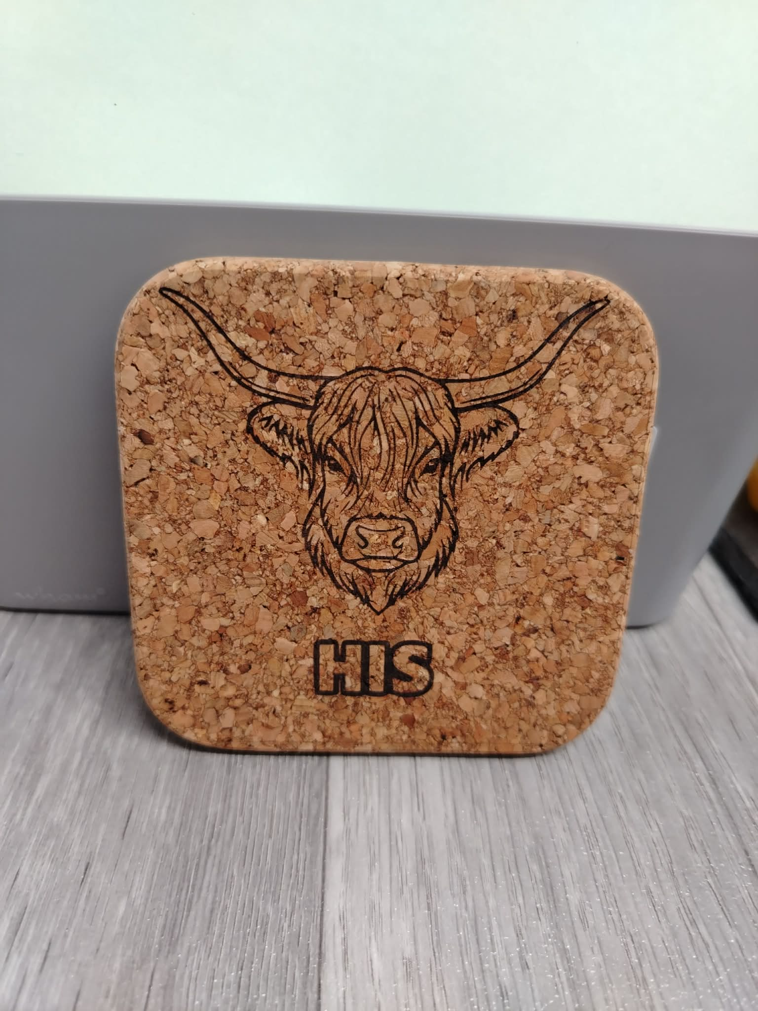 His and Hers highland cow coaster