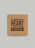young at heart slightly older in other places cork coaster